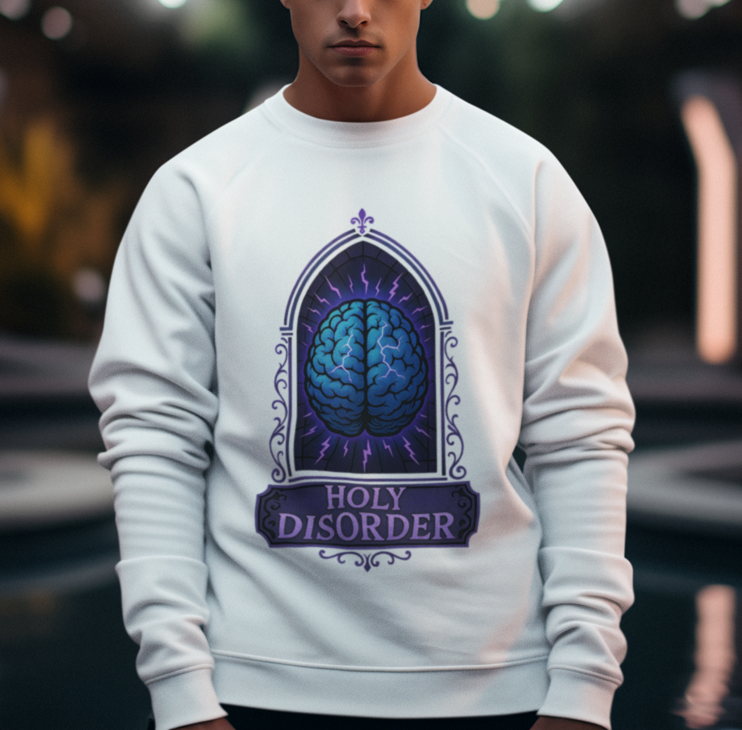 Person wearing a white sweatshirt with a brain design and 'Holy Disorder' text.