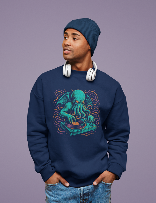 Man wearing a navy sweatshirt with a graphic design of an octopus Cthulhu as a DJ, standing against a purple background.