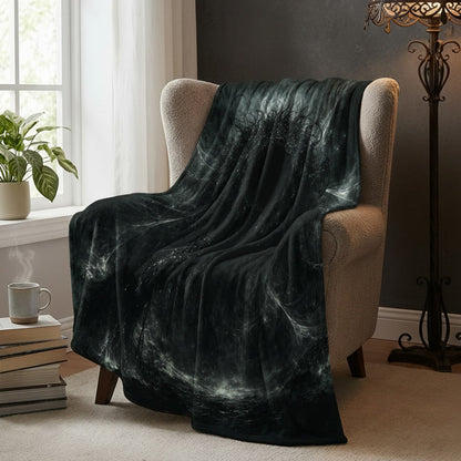 Azathoth dark art blanket on an armchair